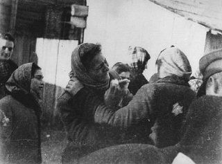 scene during the deportation of Jews from the Kovno ghetto. Kovno, Lithuania, 1942.